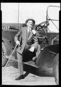 "Al" in bowery outfit with 1907 Packard, Southern California, 1933