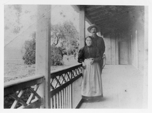 Mr. and Mrs. De La Riva on Porch at Adobe