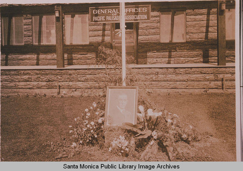 An American Flag stands above a memorial plaque to President Woodrow Wilson at the Assembly Camp in Temescal Canyon, Pacific Palisades, Calif