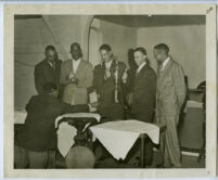 Norman O. Houston, Edwin Jefferson, and Ivan J. Johnson III at a golf awards ceremony, Los Angeles, 1940s