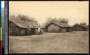 Indigenous family in front of a house, Matadi, Congo, ca.1900-1930