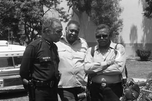 Jessie Brewer talking with Guy Crowder and Jim Cleaver at the Black Family Reunion event, Los Angeles, 1989