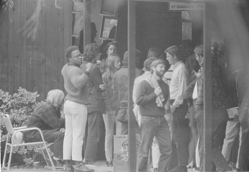 Students giving support to fellow students who were summoned to appear at the UCSD Police station for their involvement earlier in the month of taking over Urey Hall on the UCSD campus in protest against the Vietnam War. May 27, 1970