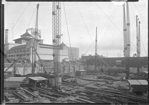 Construction of a large building, possibly in Los Angeles's Chinatown