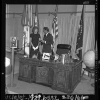 Peter and Pat Lawford at John F. Kennedy exhibit at California Museum of Science and Industry, 1964