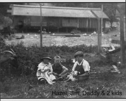 Hazel, James and Russell Nissen sitting with two kids, Petaluma, California, about 1923