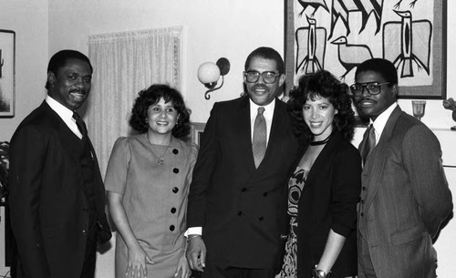 David S. Cunningham, Jr. posing with Mary Helen Thompson and others, Los Angeles, 1985