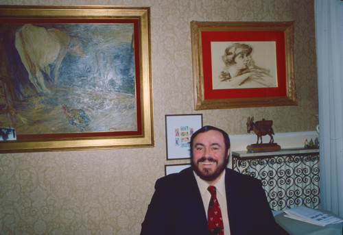 Luciano Pavarotti with art