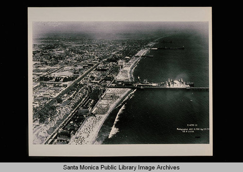 Aerial view of the Pacific Coast showing the Santa Monica Pier and Ocean Park Pier on July 13, 1930