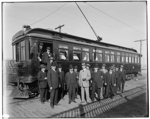 A group shot of inspectors visiting Long Beach Steam Plant. They are standing by the "El Peregrino