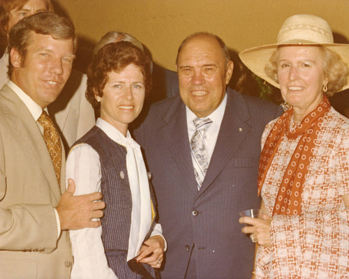 Guests pose at Pepperdine reception for President Ford, 1975
