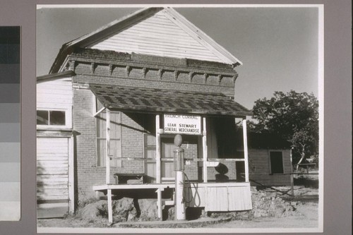 [Leah Stewart General Merchandise store, with gas pump.] French Corral. 1939