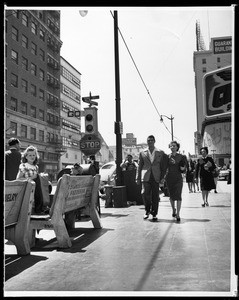 View of a sidewalk near the intersection of Hollywood Boulevard and Vine Street in Hollywood, 1953