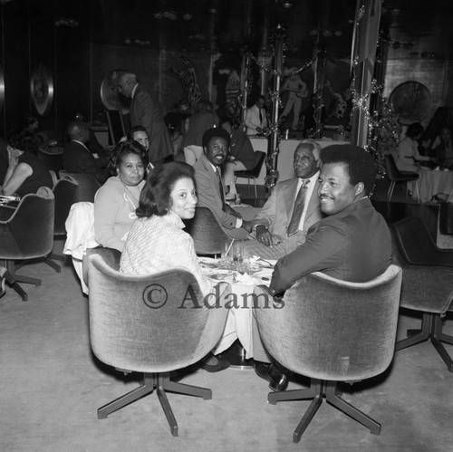 Two African American couples at a table, Los Angeles, 1967