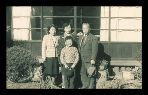 Yoshio Ichikawa family in front of their home