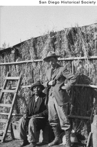 Photographer Edward H. Davis standing next to Locario Chavez, a Rincon Indian
