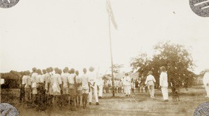 Unfurling flag at Uzuakoli sports, Nigeria, 1924