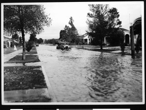 Flooded street looking north on 4th Avenue from Slauson, January 1932