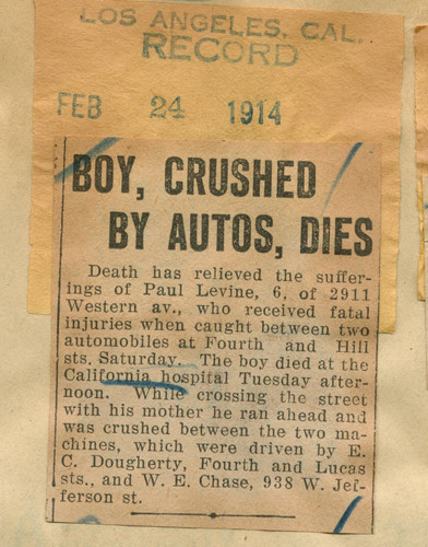 Boy, crushed by autos, dies
