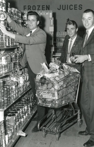 Students purchasing food to send to troops in Vietnam, 1965