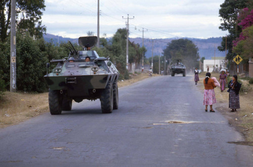 A Guatemalan Army Cadillac Gage Commando armored car patrols the streets of Chimaltenango, Chimaltenango, 1982