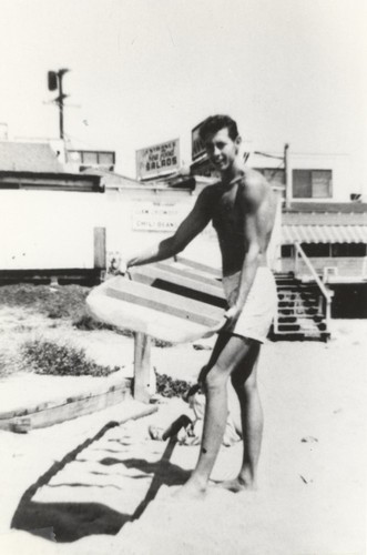 Dick "Andy" Anderson showing construction of board at Cowell Beach