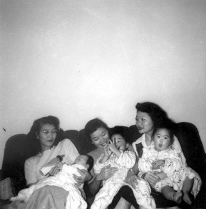 Nobuko Watanabe and Chris Lyou, Anna Lyou holding Rebecca Yoon, Mary Lyou holding Jennifer Yoon