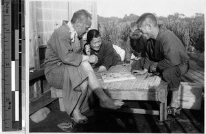 Men playing a board game, Japan, ca. 1932