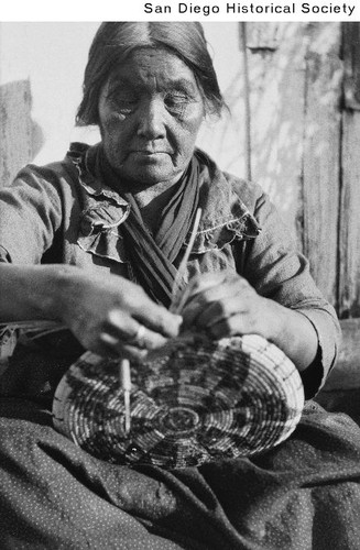 Pauma Indian Esperanza Sobenish weaving a basket