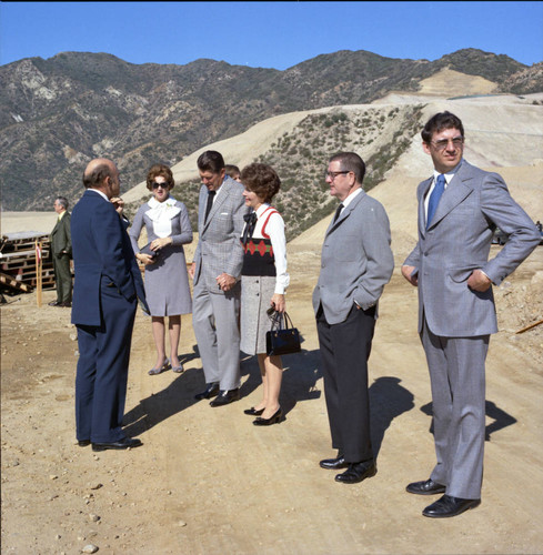 Ronald Reagan and group tour campus during Pepperdine University tree planting dedication, 1973