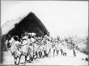 Boys shooting with bows and arrows, Gonja, Tanzania, ca. 1927-1938