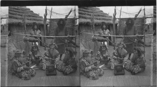 Ainu men, the aborigines of Japan in feast attire, Island of Yezo, Japan