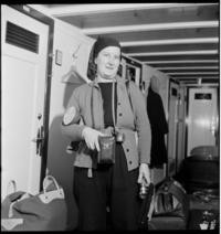 1st Day War(?) [Therese Bonney with her Rolleiflex and other camera gear, arriving on the ship Kastelholm]