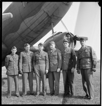 [US soldiers (Airborne) at airfied, probably departing on leave for Nice, in the United States Riviera Rest Area (USRRA).] [Misidentified in logbooks as part of: Ordonnance Reims series.]