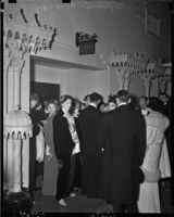 Crowd waiting to enter Shrine Auditorium for a performance of Tristan and Isolde on opening night of the opera, Los Angeles, November 15, 1937