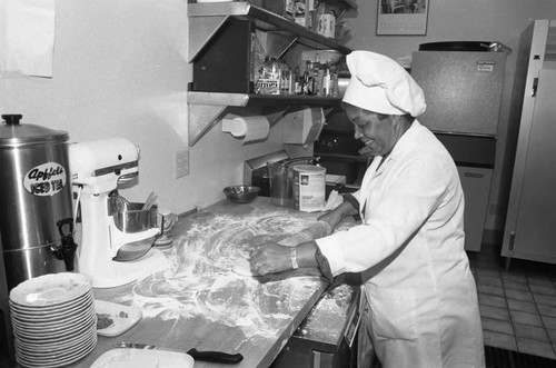 Ciro's Restaurant chef rolling dough, Los Angeles, 1987