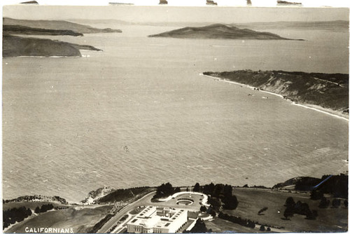 [Aerial view of the Palace of the Legion of Honor with San Francisco Bay in background]