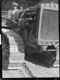[Man on tractor.] [negative]