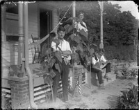 Sondag, 6 Augs. 1911. [Three men on porch.] [negative]