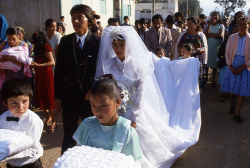 A young bride, a young groom, and their wedding guests, Chiquimula, 1982