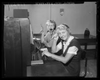 Operators Grace Miller and Theresa Vincent in 1959 manning the switchboard at Los Angeles' Air Pollution Control District office