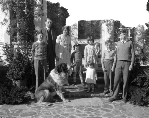 Jameson family and dog on porch