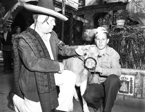 Presentation of bull to young man at 4-H event