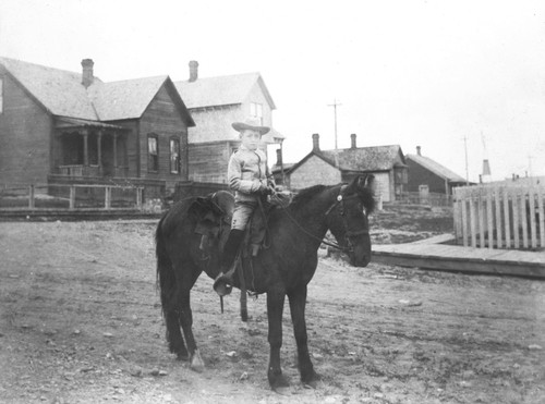 Child riding horse