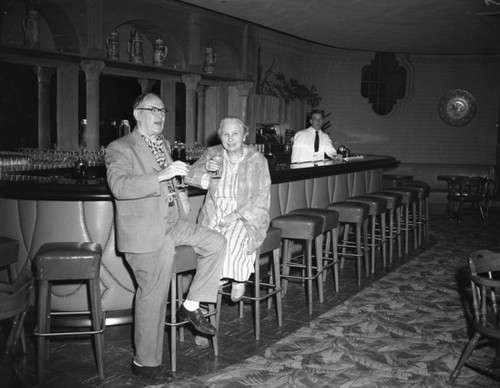 DeWitt and Allis Hutchings at bar, Mission Inn