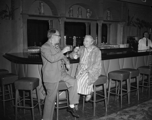 DeWitt and Allis Hutchings at bar, Mission Inn