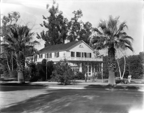 Jameson family outside of house