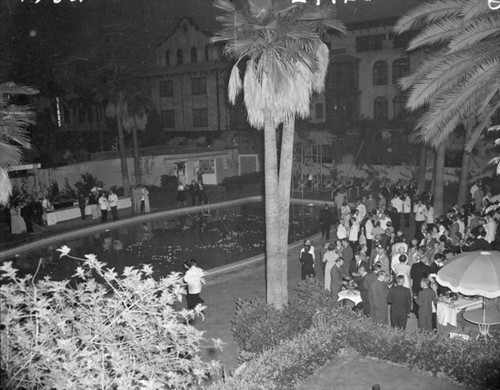 Party on pool patio, Mission Inn