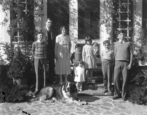 Jameson family and dog on porch