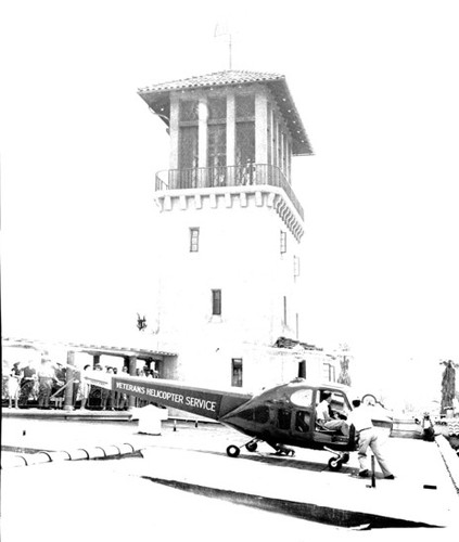 Helicopter landing on roof, Mission Inn